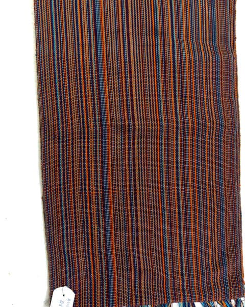 A terracotta and indigo stole from the same kind of warp, entirely different