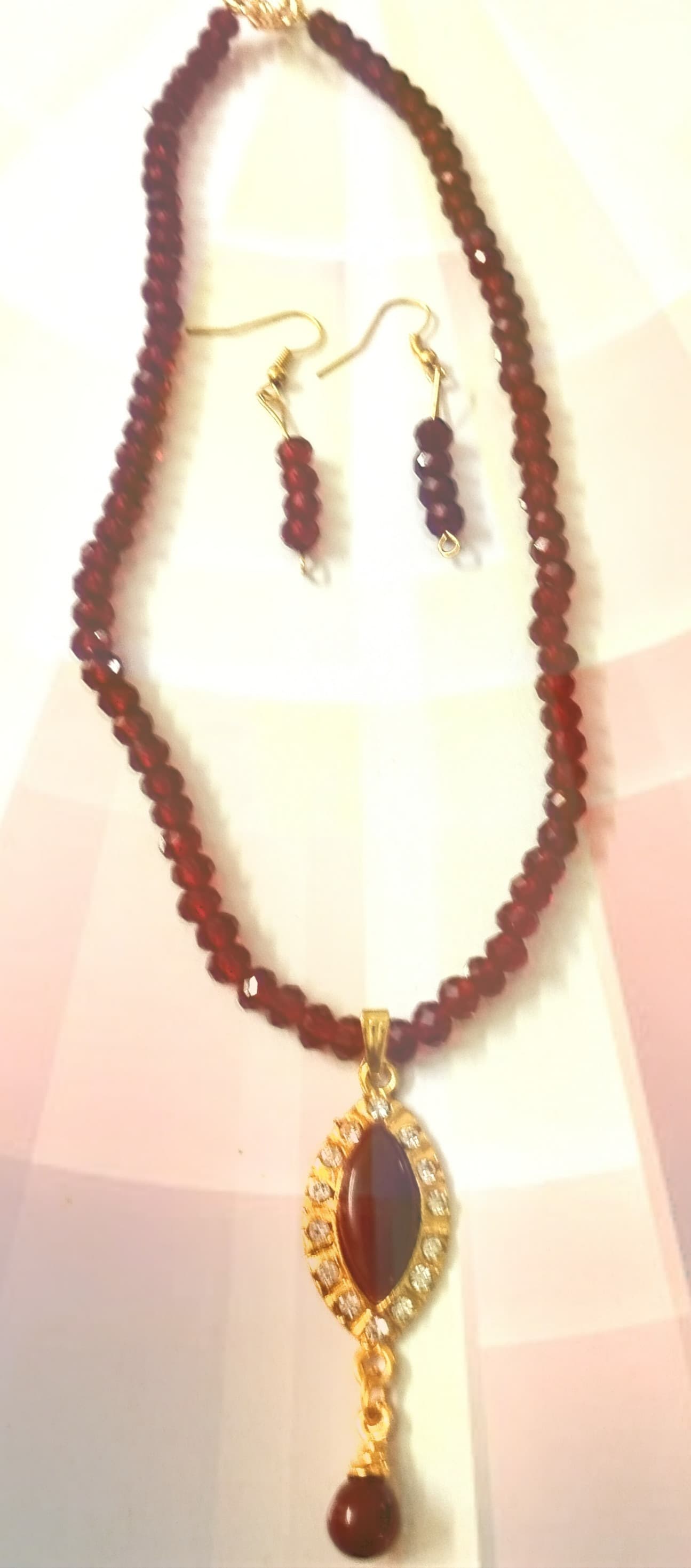 Necklace and earring set — plum with a gold and amber drop