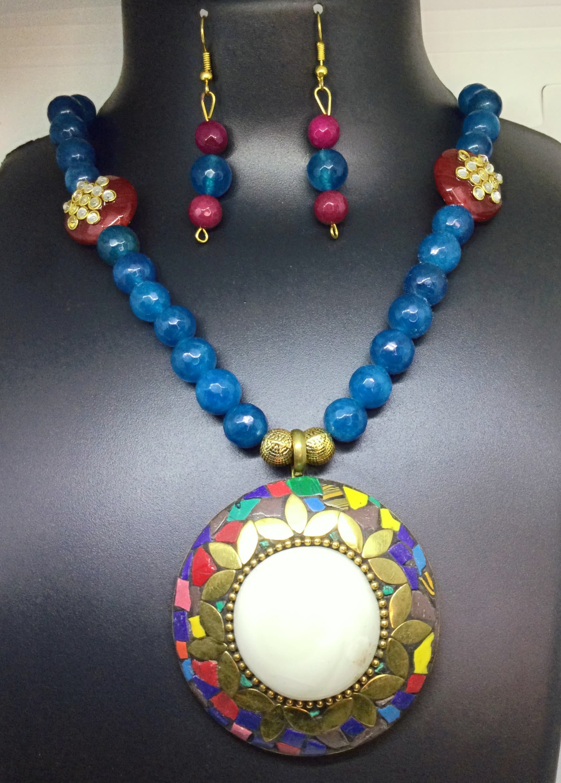 Necklace and earring set — turquoise and pink with a large gold pendant