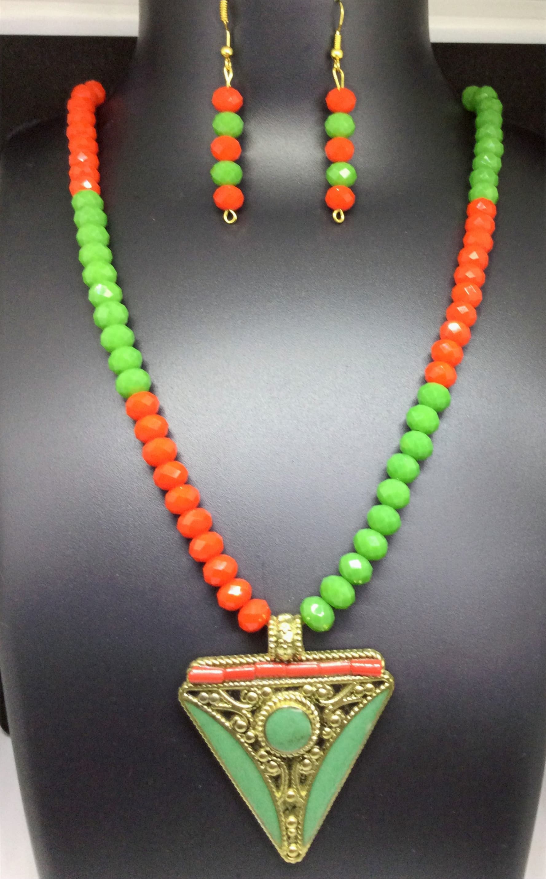 Necklace and earring set — orange and green with a green triangle