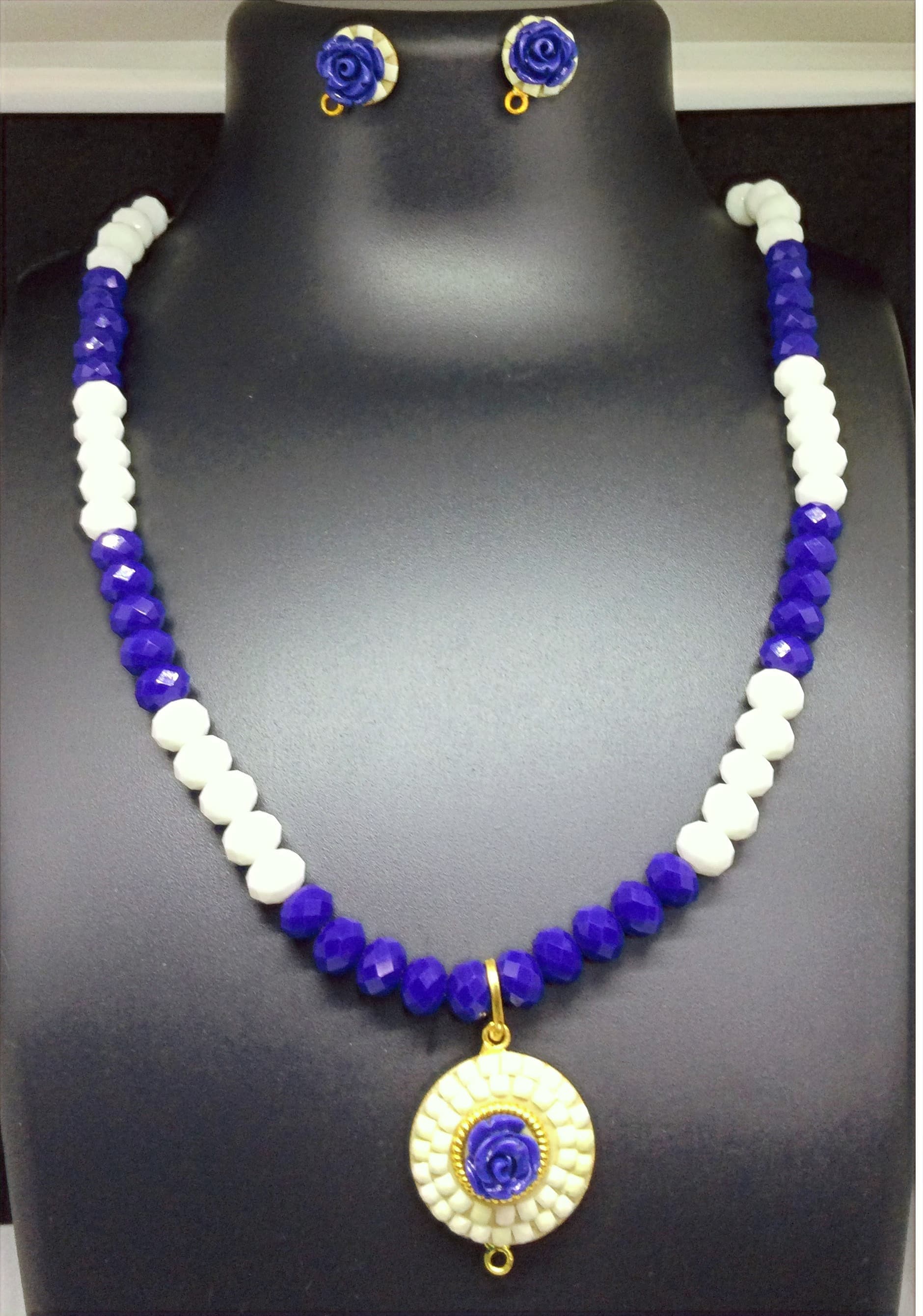 Necklace and earring set — royal blue and white with a gold pendant
