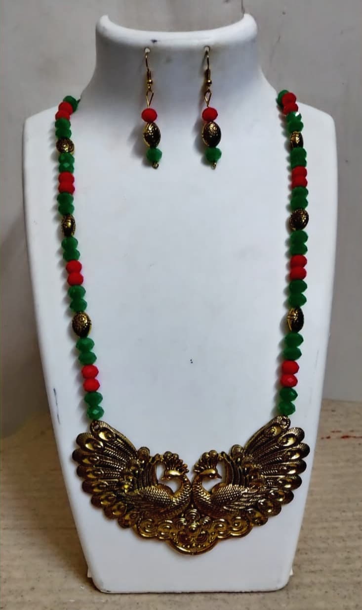 Peacock necklace and earring set — green and red with a brass collar pendant