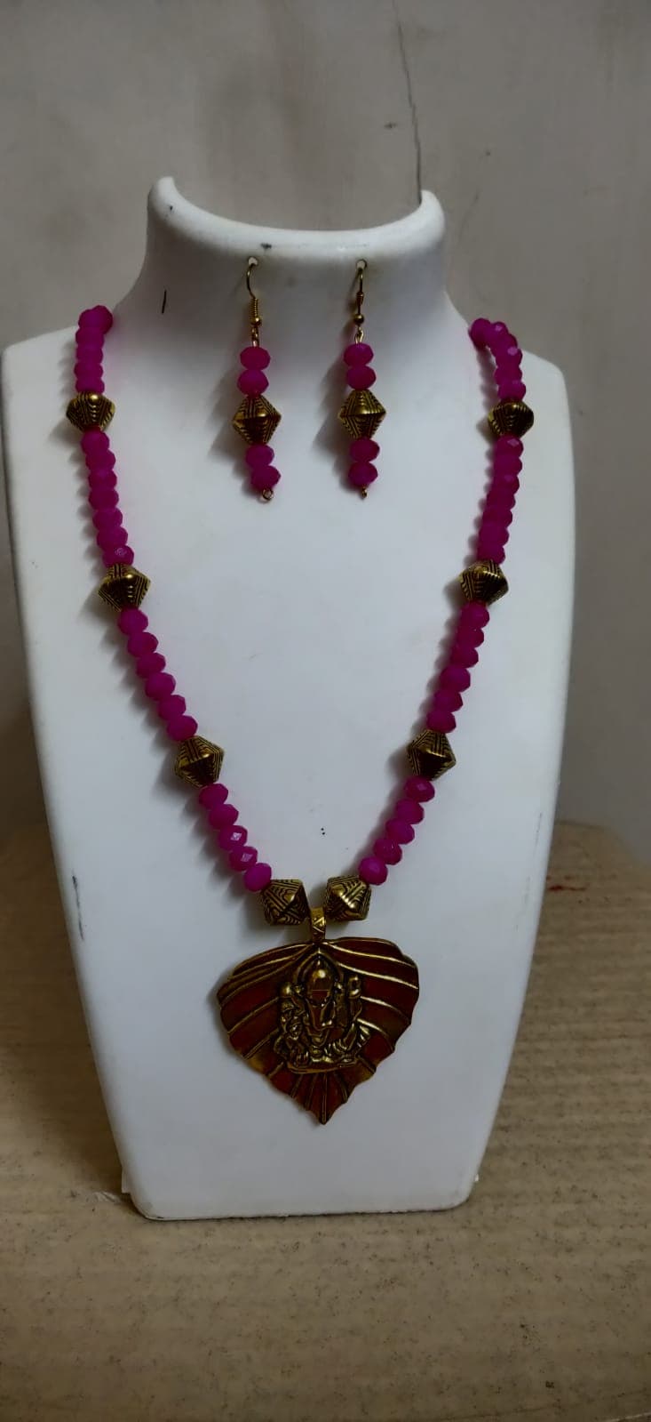Necklace and earring set — magenta and green with a brass heart pendant