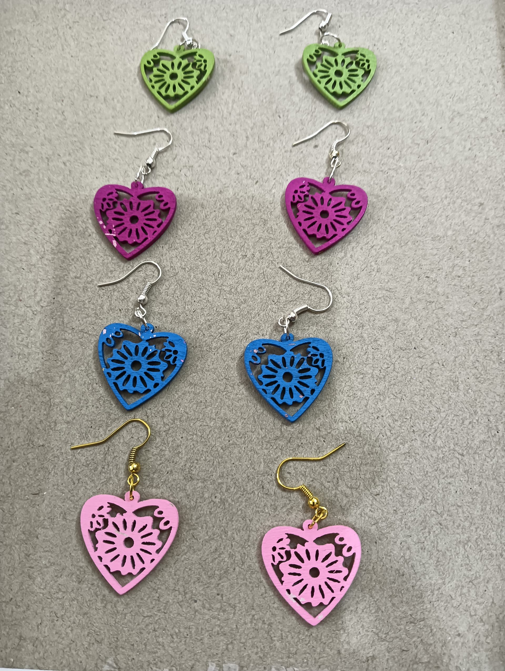 Handmade earrings — green, blue and pink quilled paper hearts