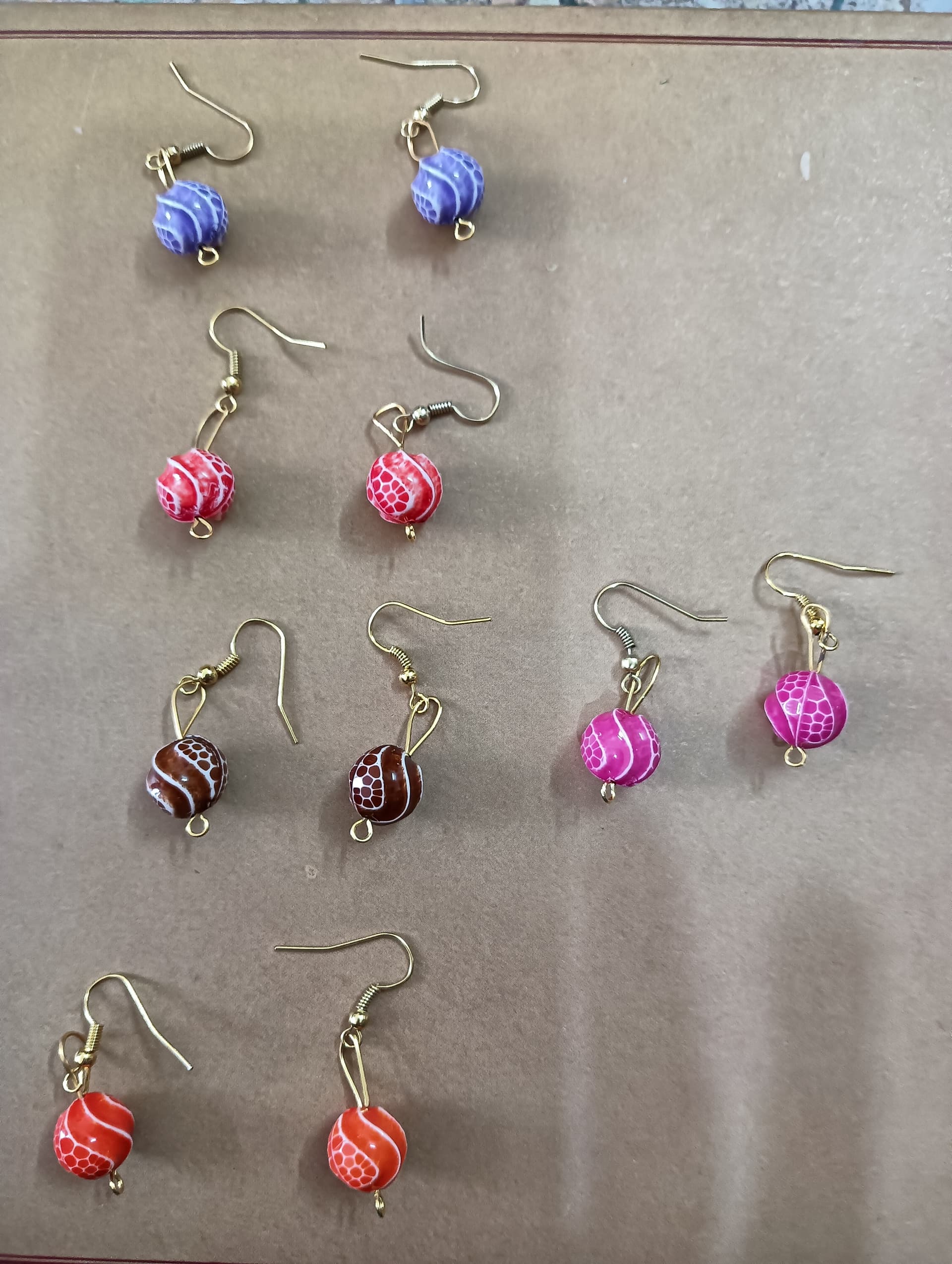 Handmade earrings — pink, red and blue beaded drops