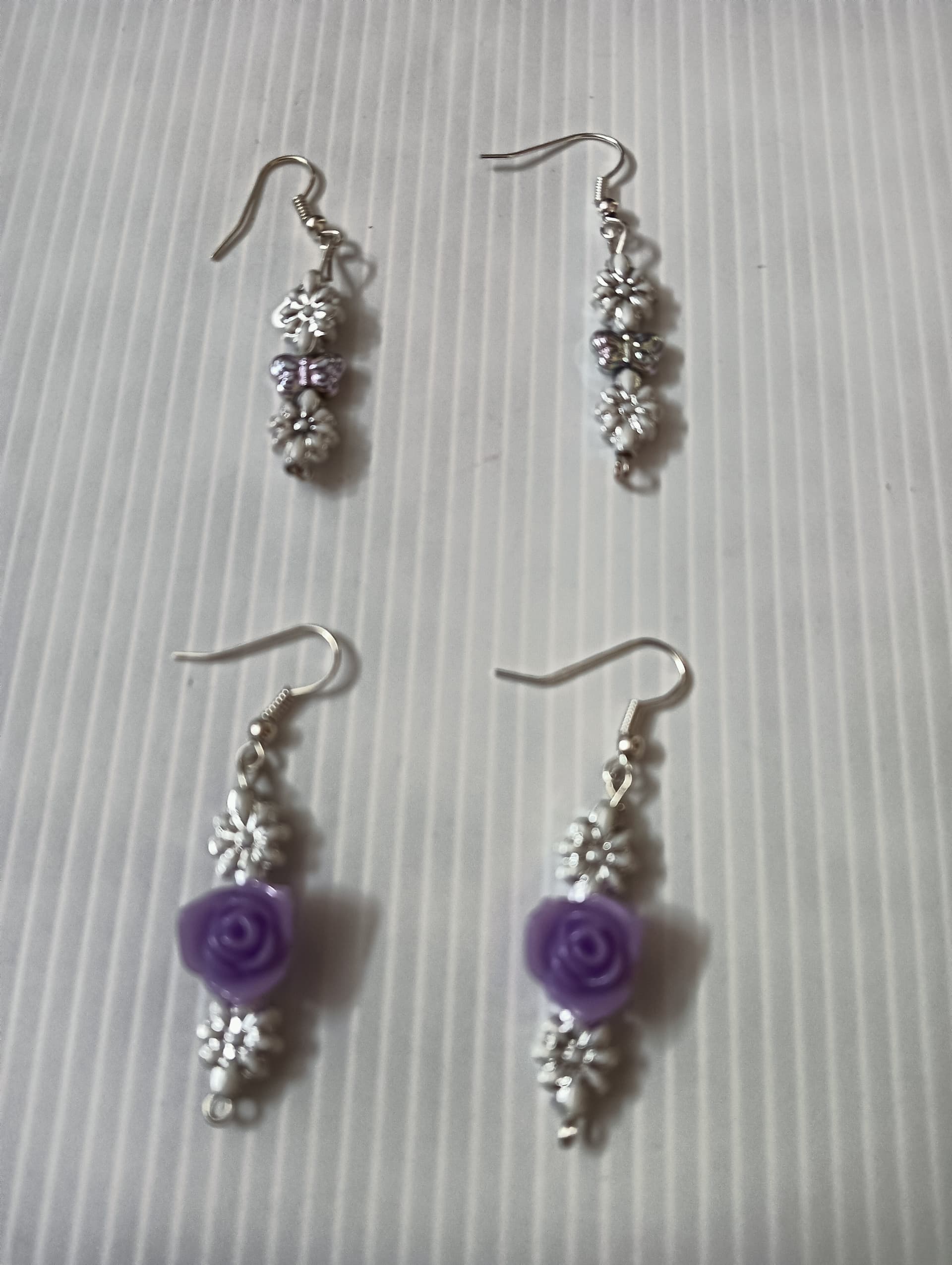 Handmade earrings — silver and violet beaded drops