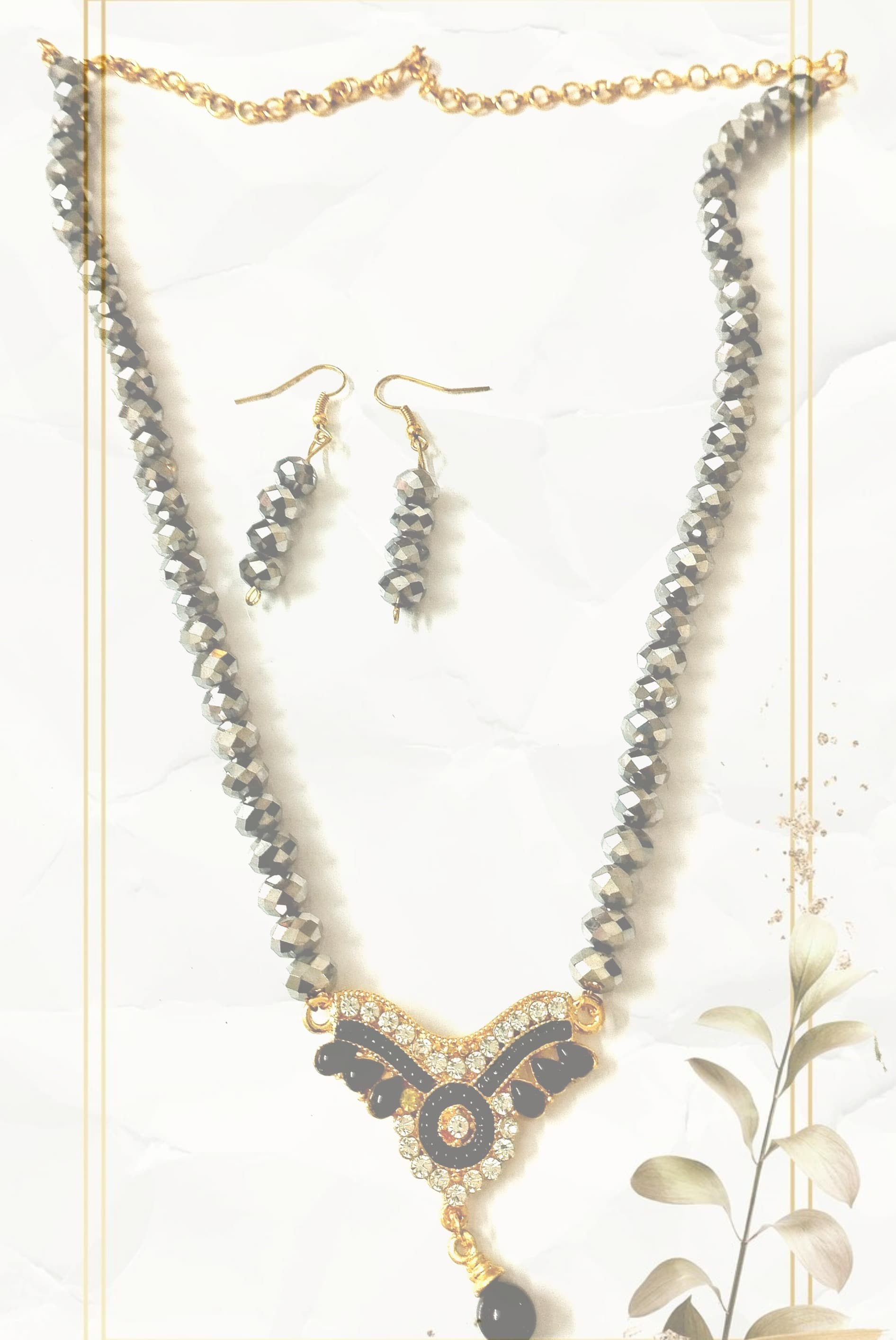 Necklace and earring set — grey with a crystal pendant