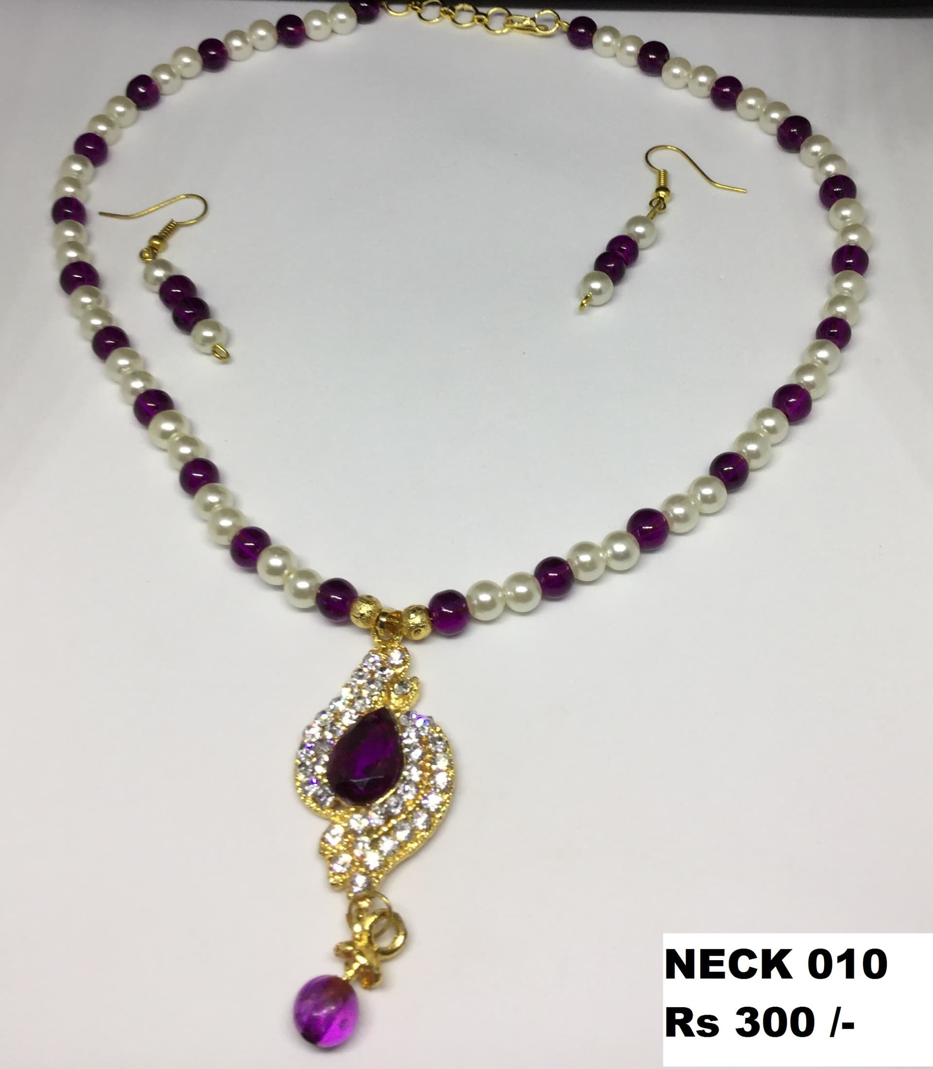 Necklace and earring set — white and plum with a violet drop