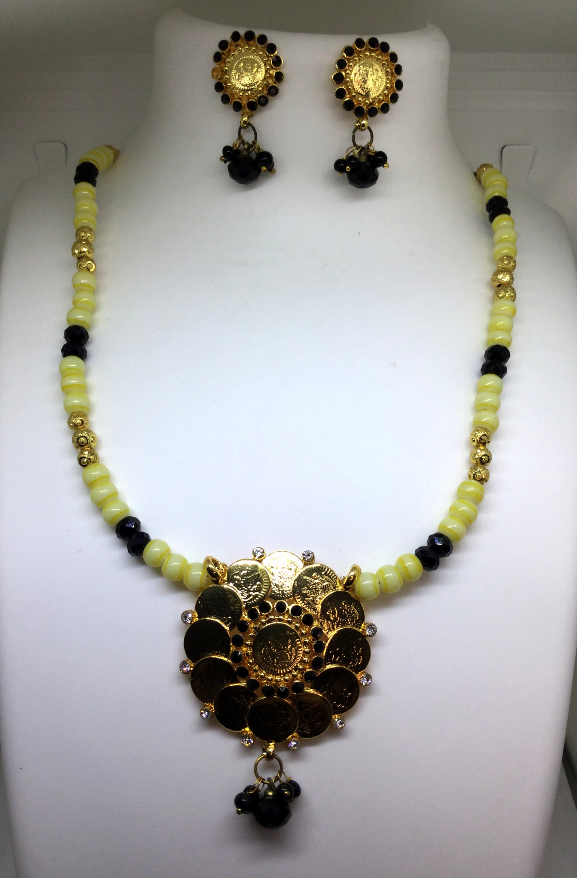 Necklace and earring set — olive and black with a black enamel pendant