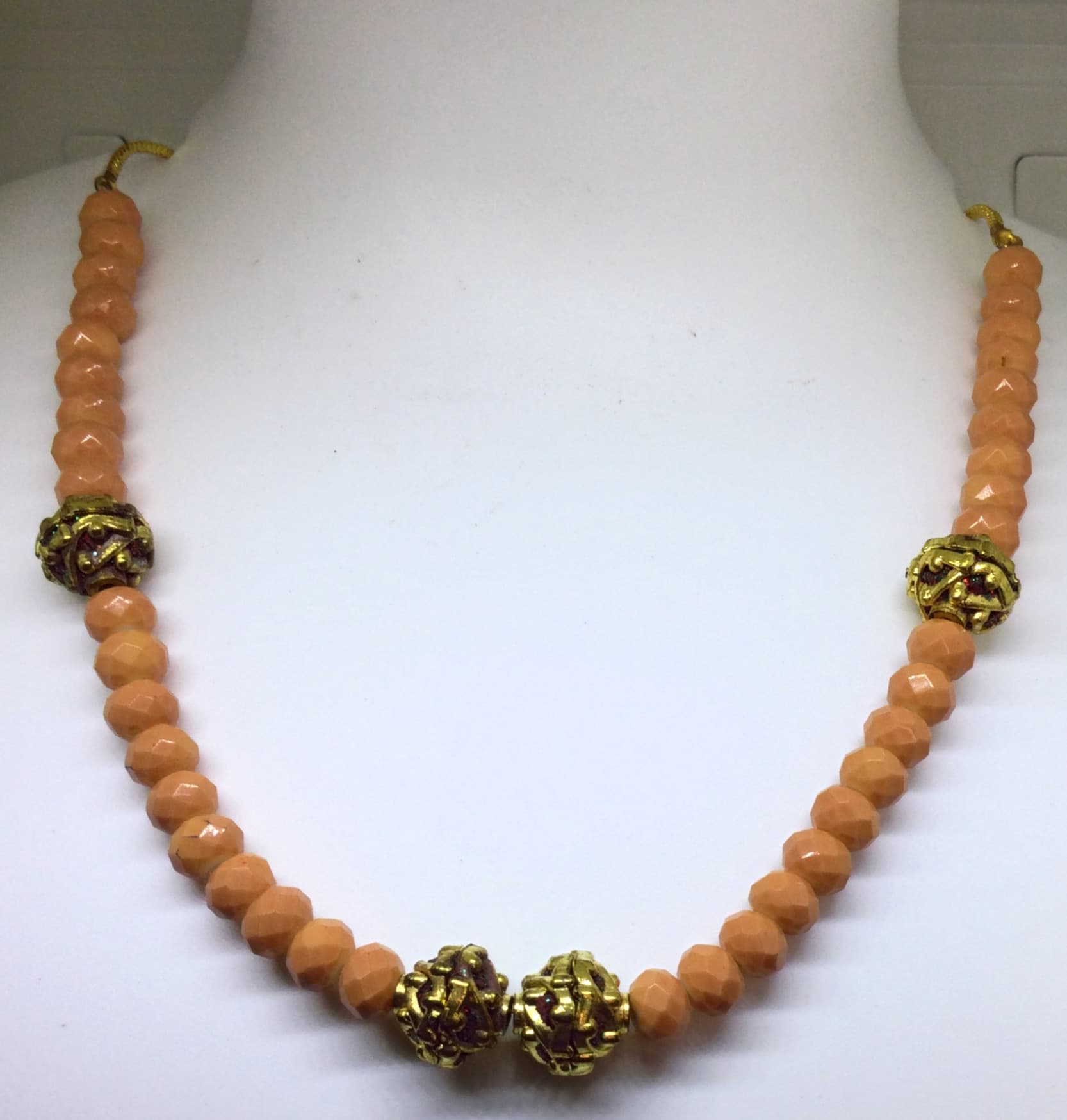 Handmade necklace — peach with gold spacers