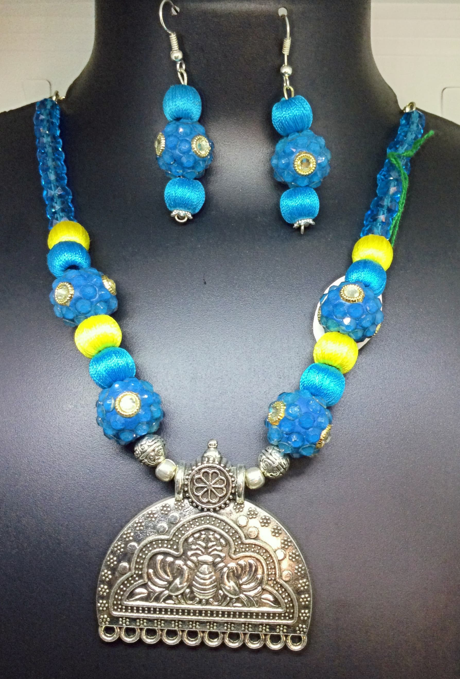 Silk necklace and earring set — turquoise and blue with a silver pendant