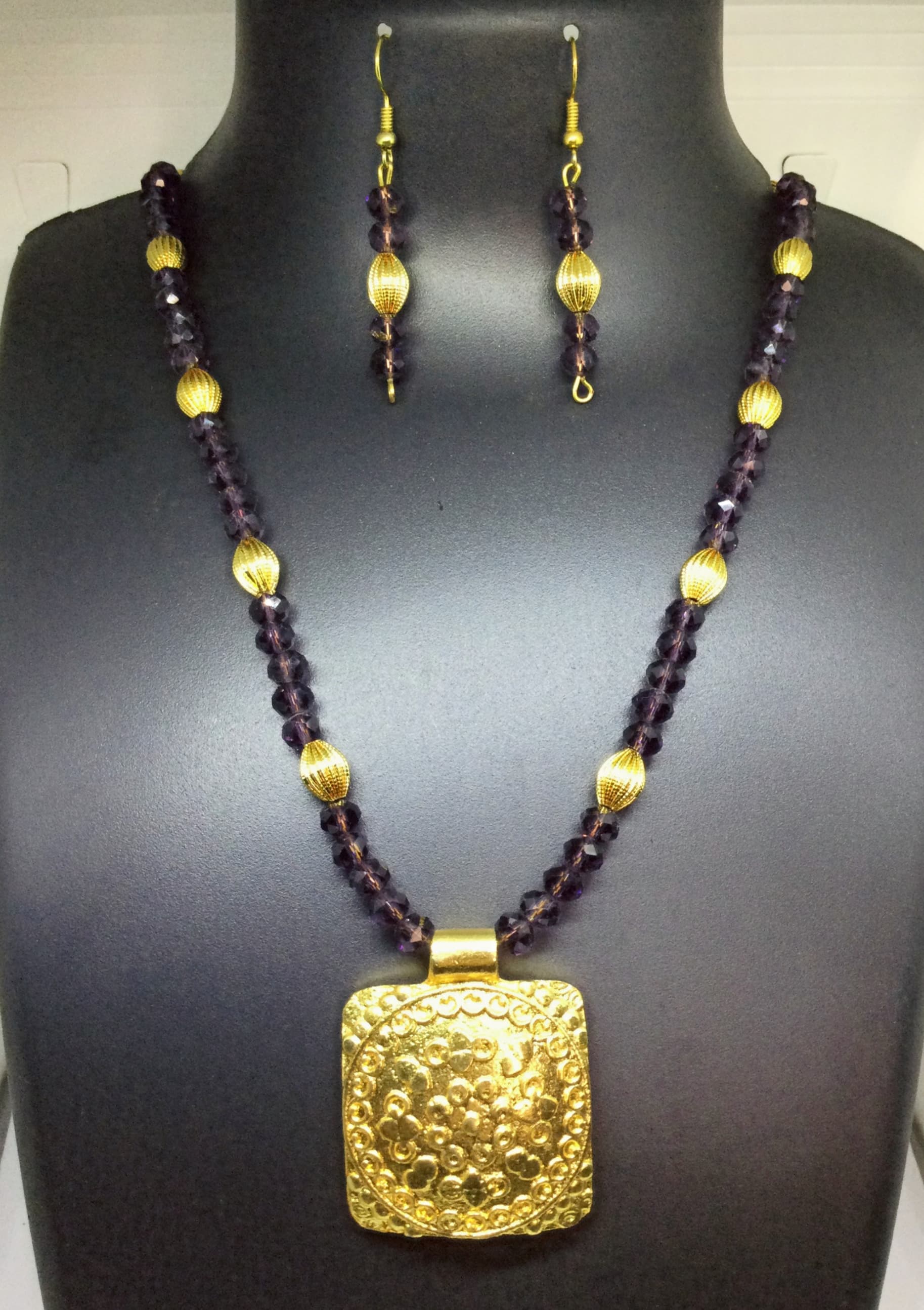 Necklace and earring set — plum and gold with a gold pendant