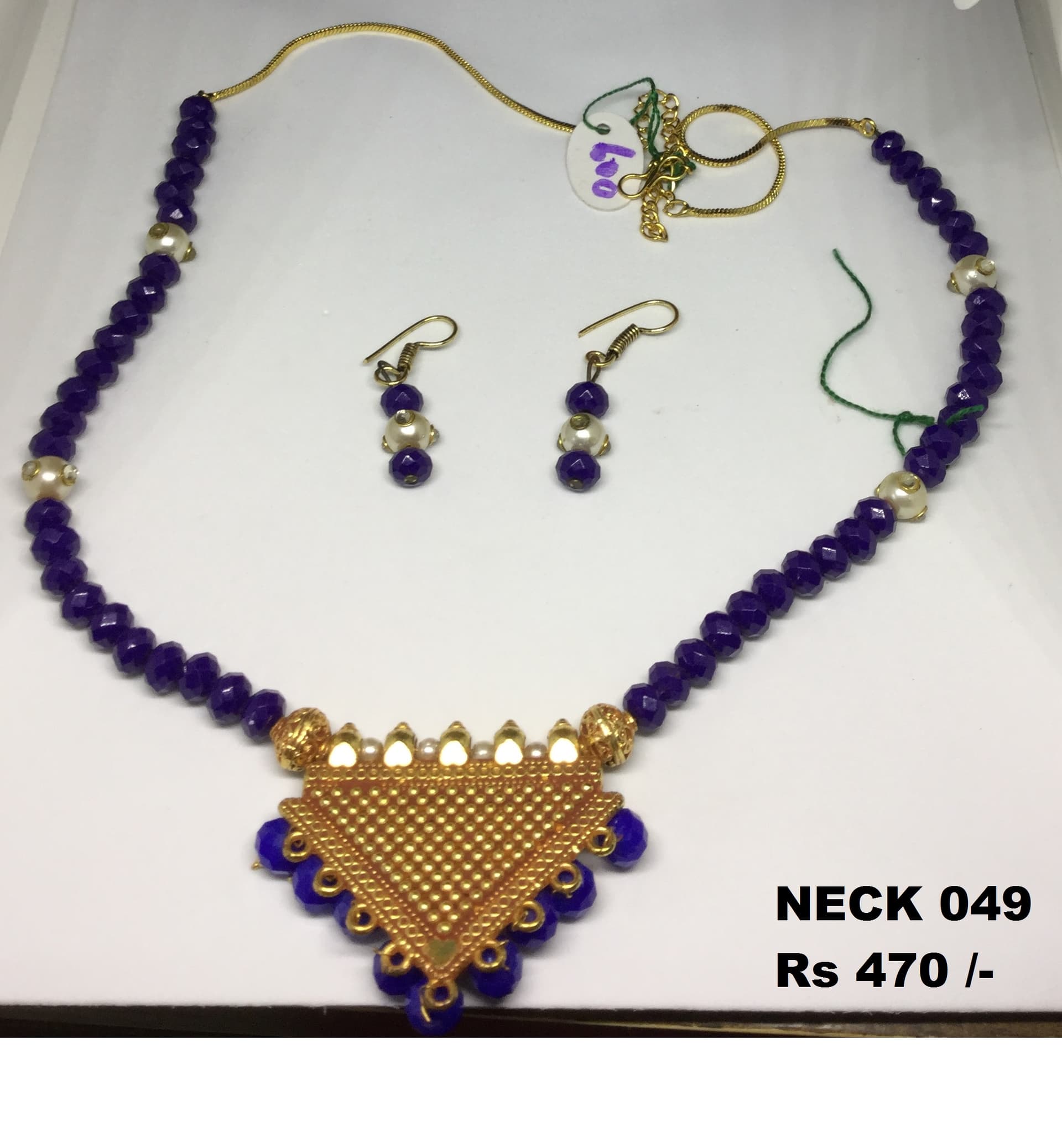 Necklace and earring set — navy blue with a gold plate pendant