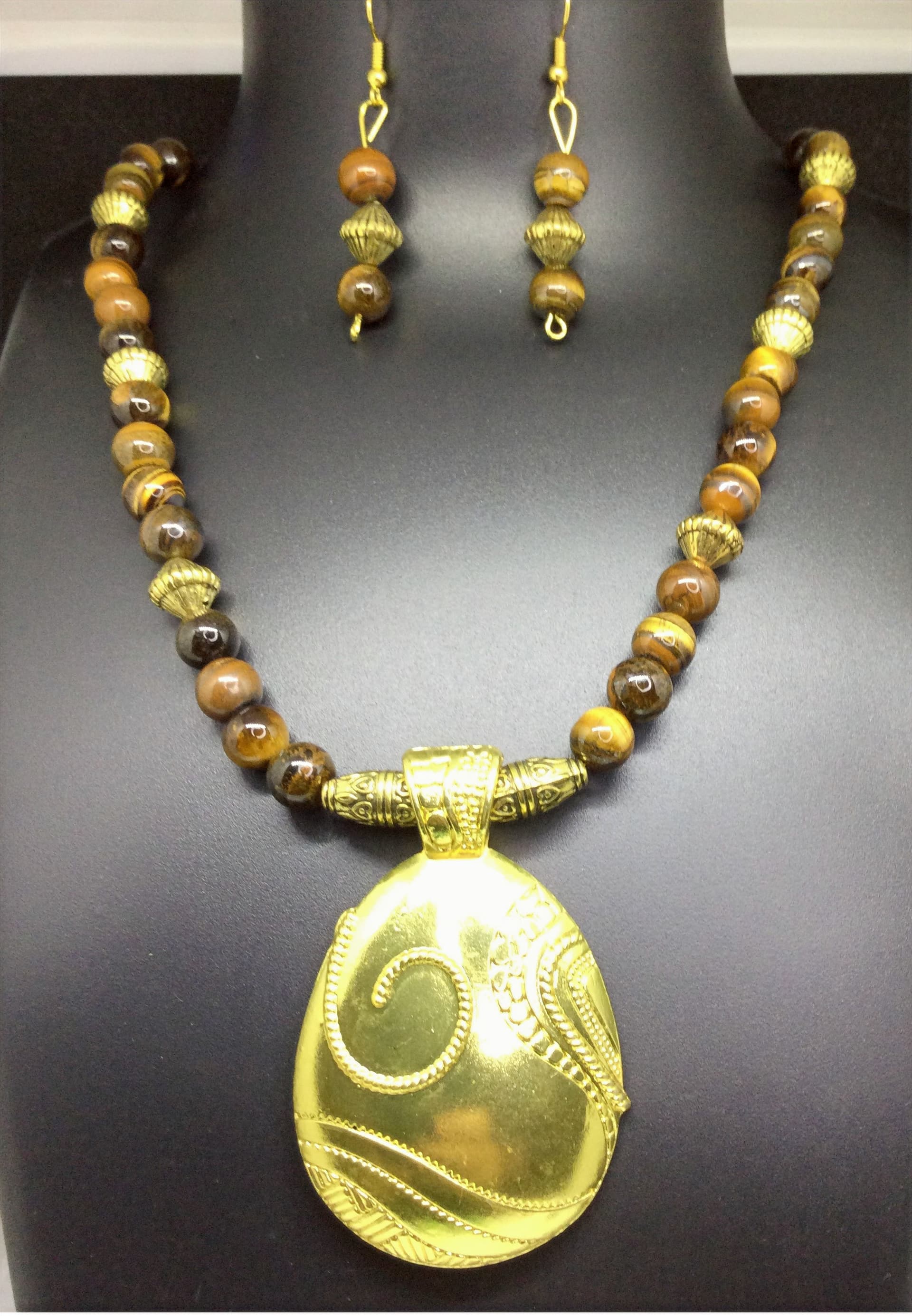 Necklace and earring set — olive and gold with a brass oval pendant