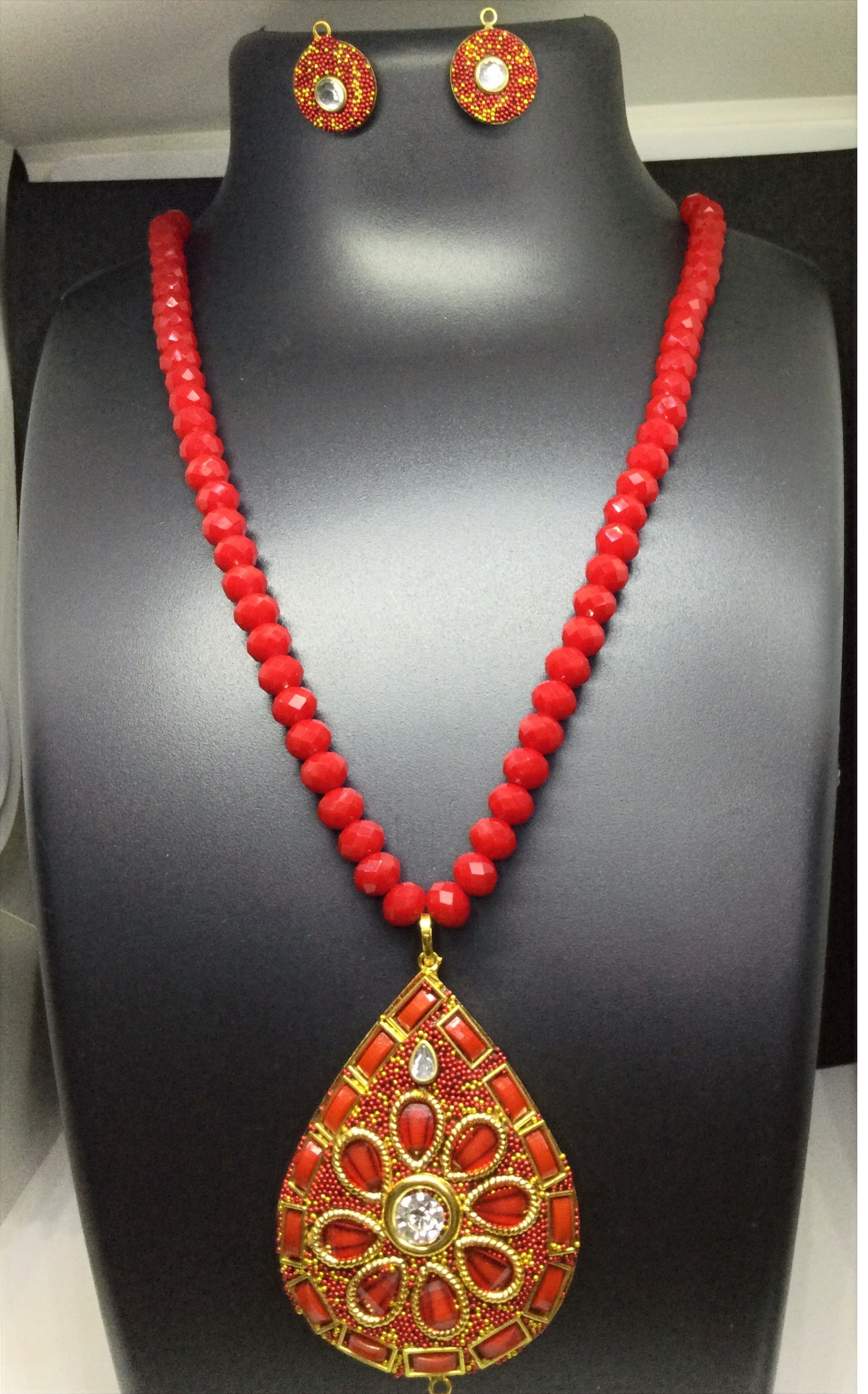 Necklace and earring set — red with a gold teardrop pendant