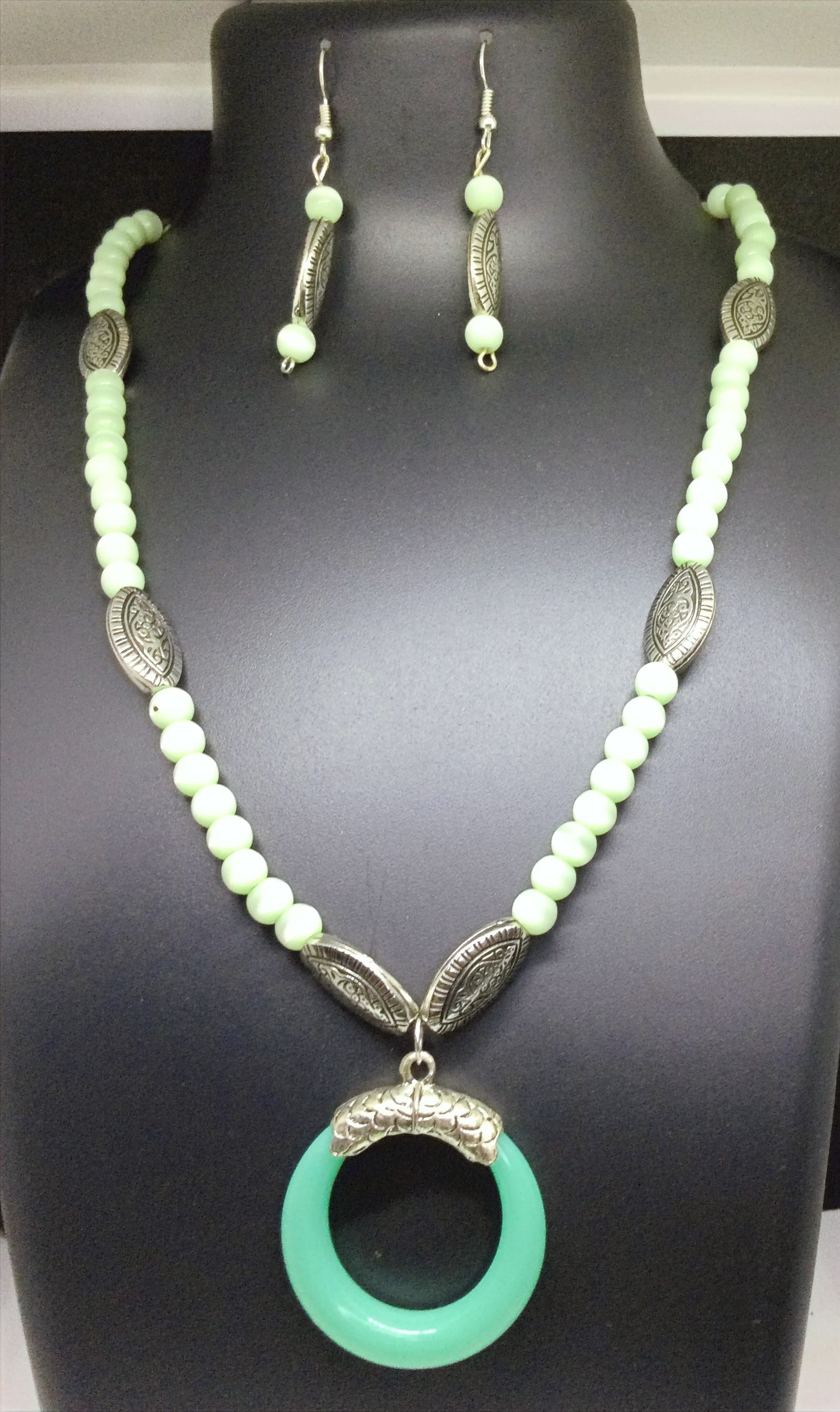 Necklace and earring set — cream with a turquoise ring pendant