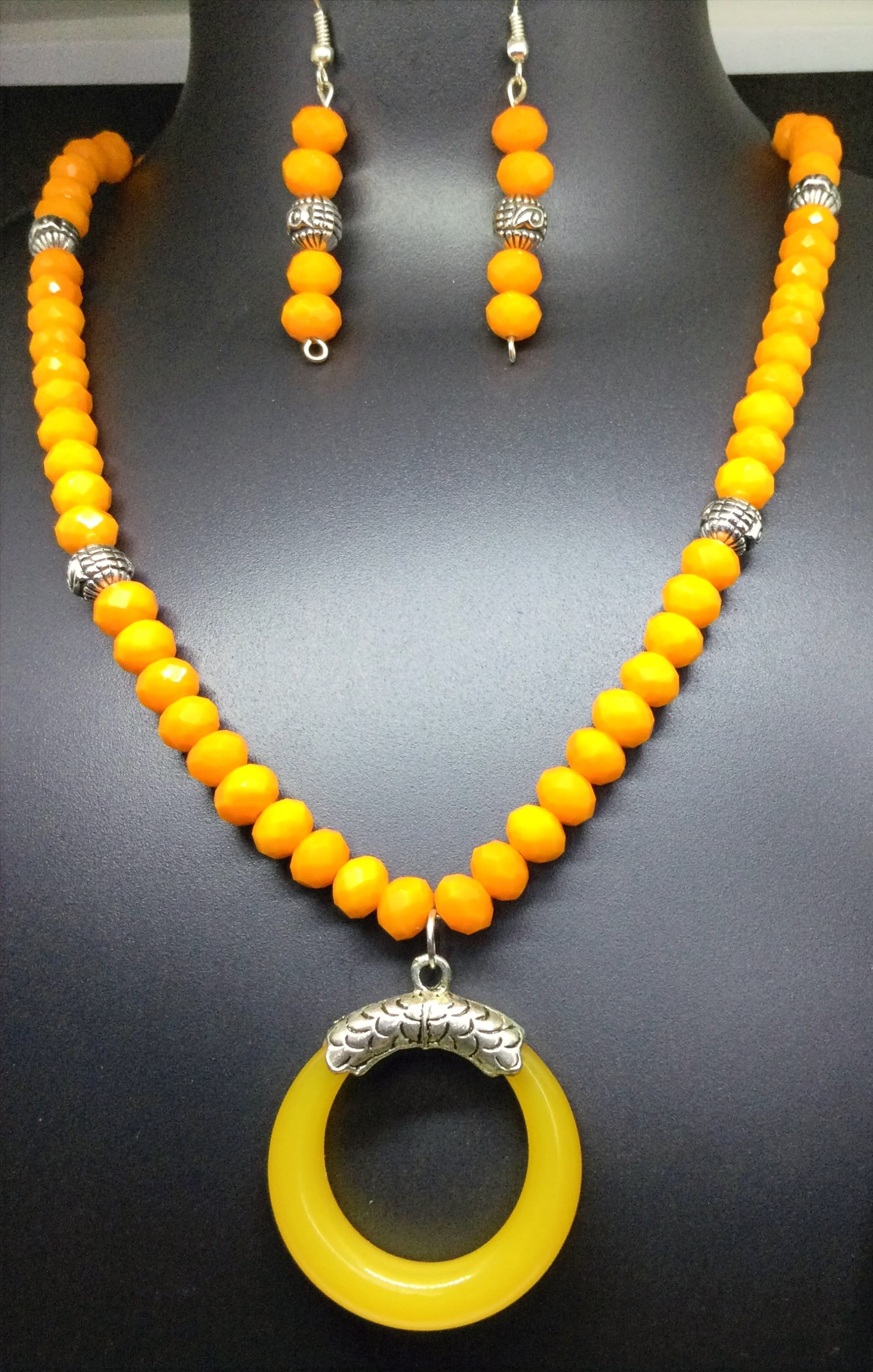 Necklace and earring set — yellow and orange with a yellow ring pendant