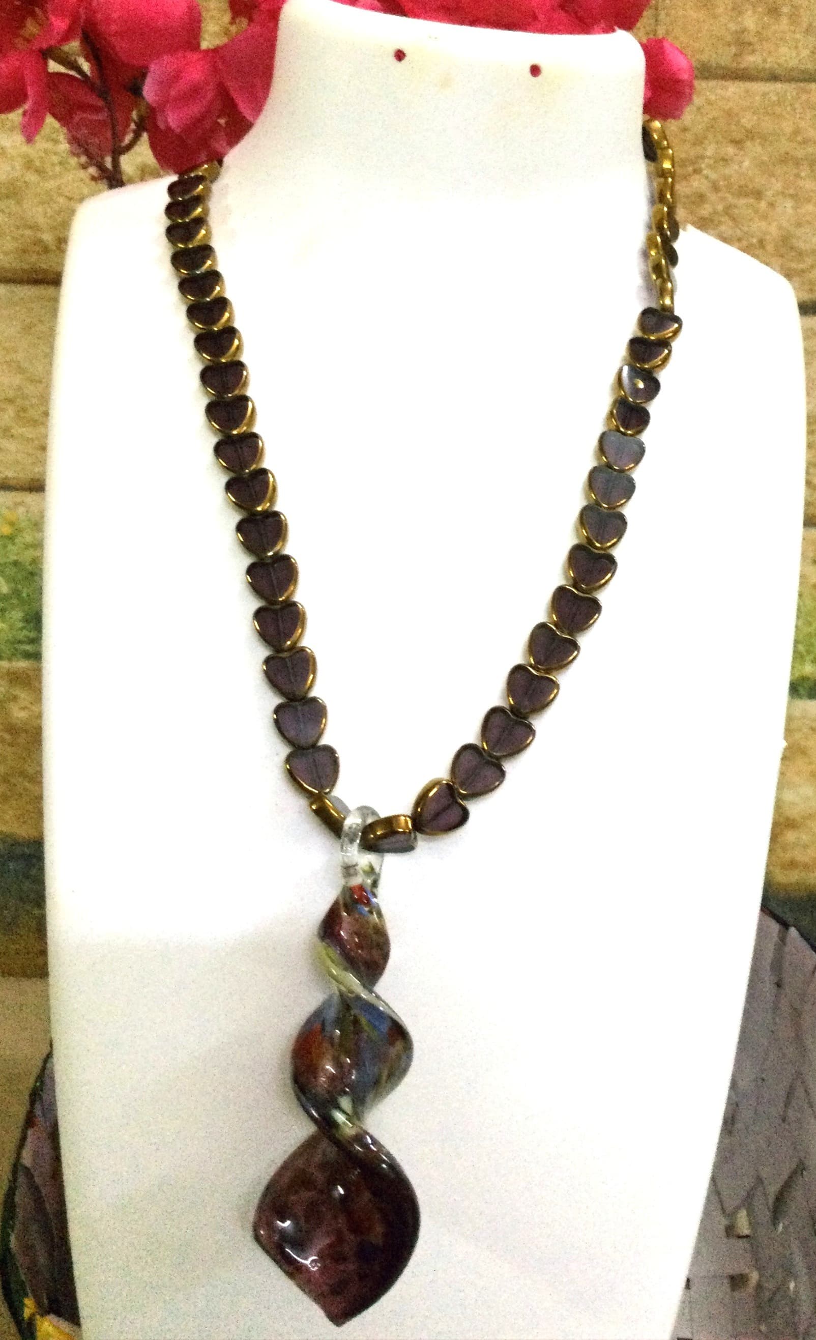 Handmade necklace — dark brown with an amber drop