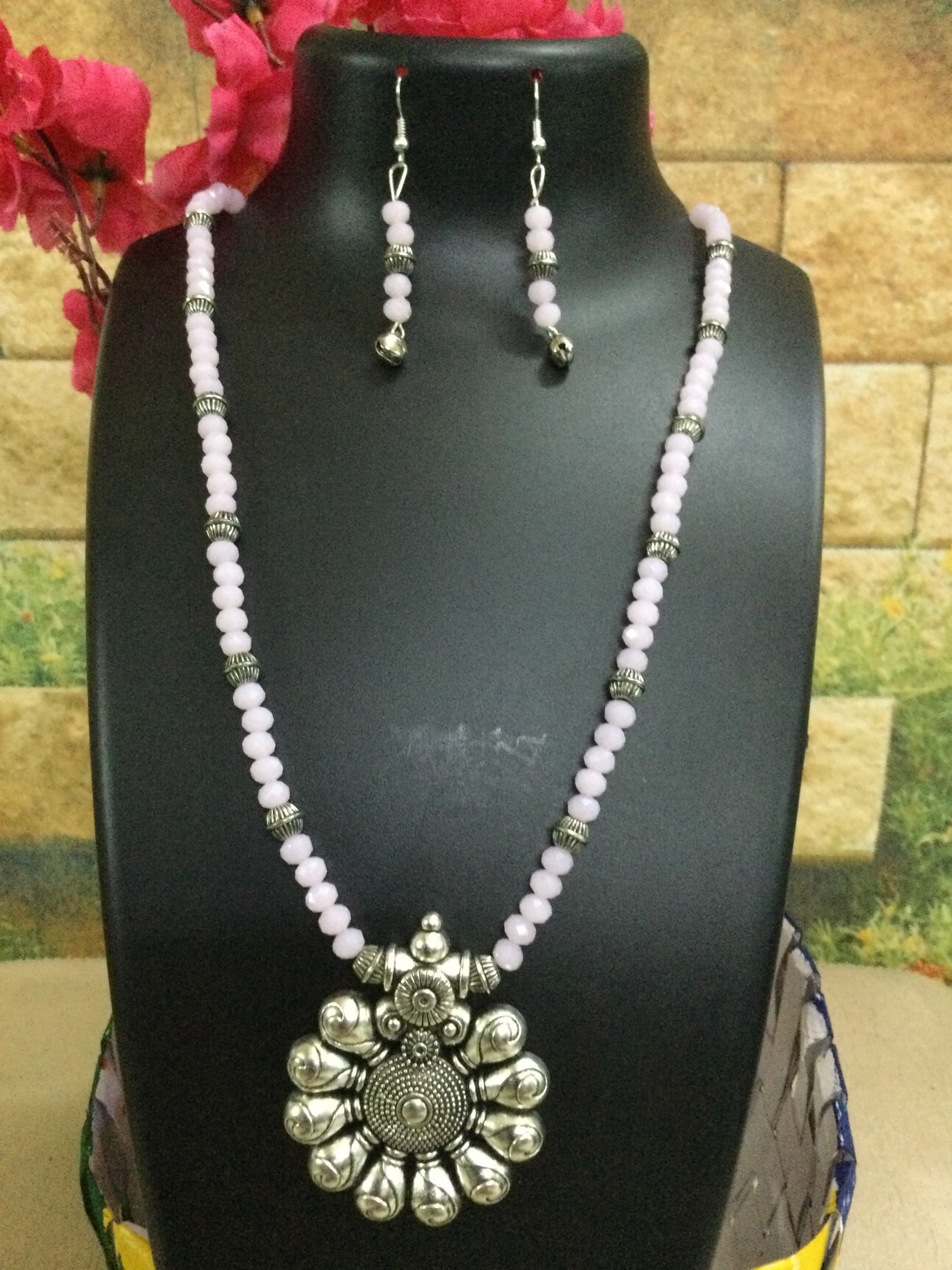 Necklace and earring set — white and grey with a silver flower pendant
