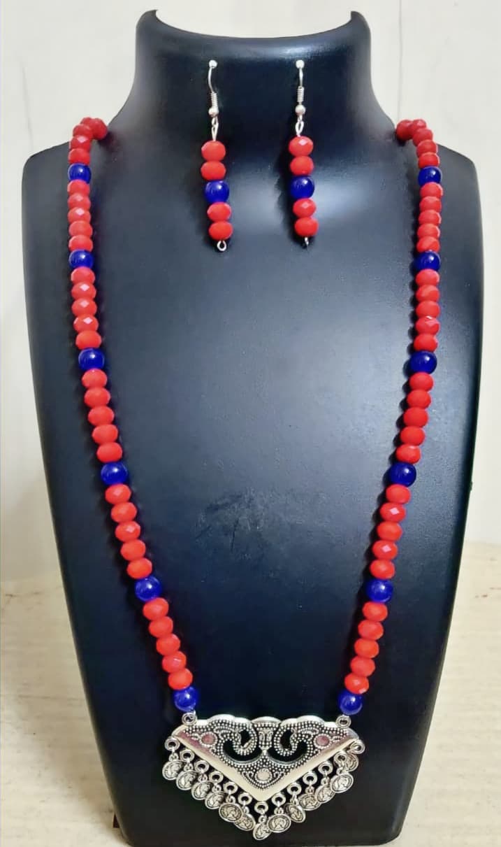 Necklace and earring set — red and blue with a silver pendant