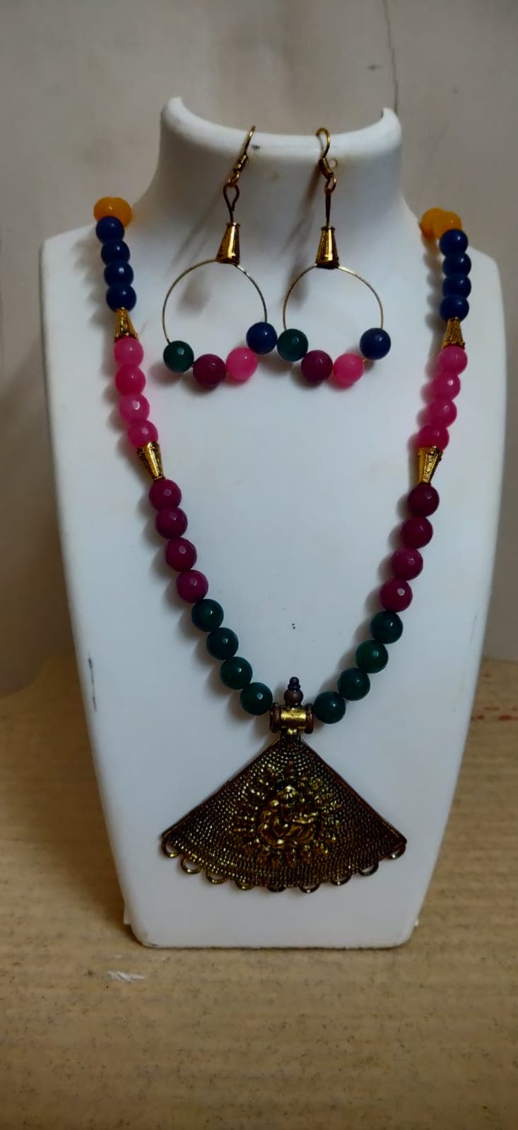 Necklace and earring set — wine with a brass fan pendant