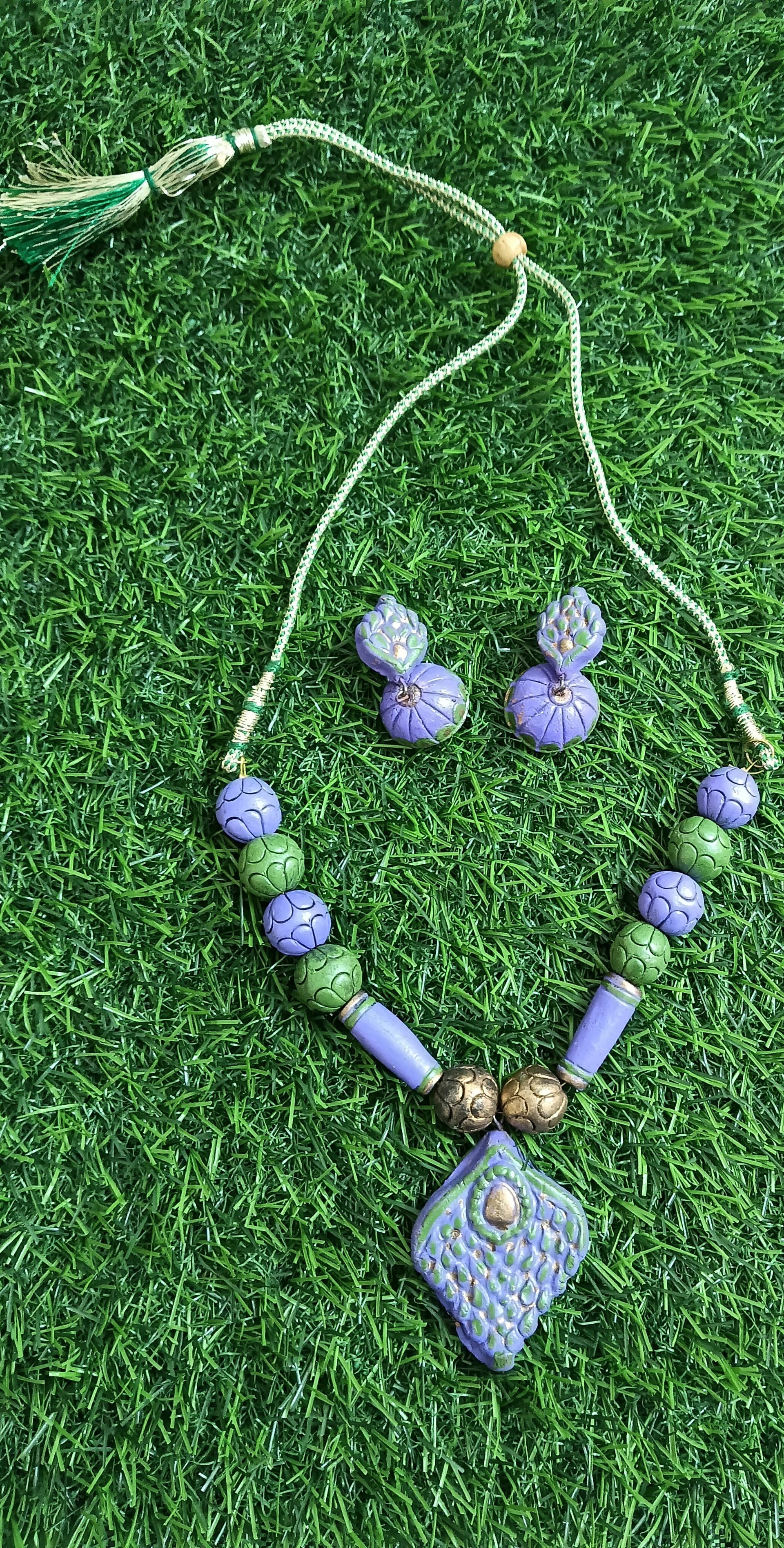 Necklace and earring set — lilac with a blue diamond pendant