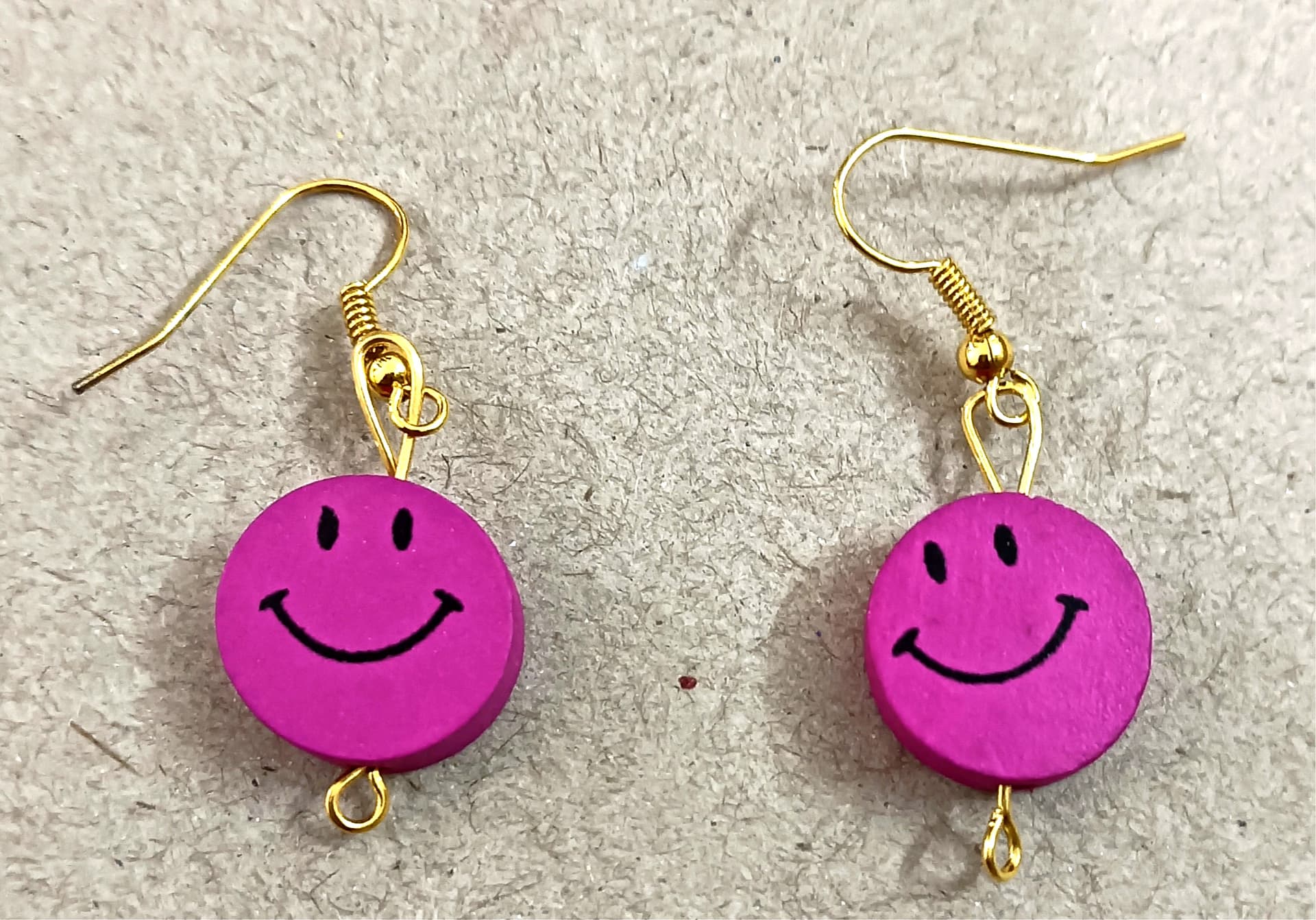 Handmade earrings — magenta smiling faces