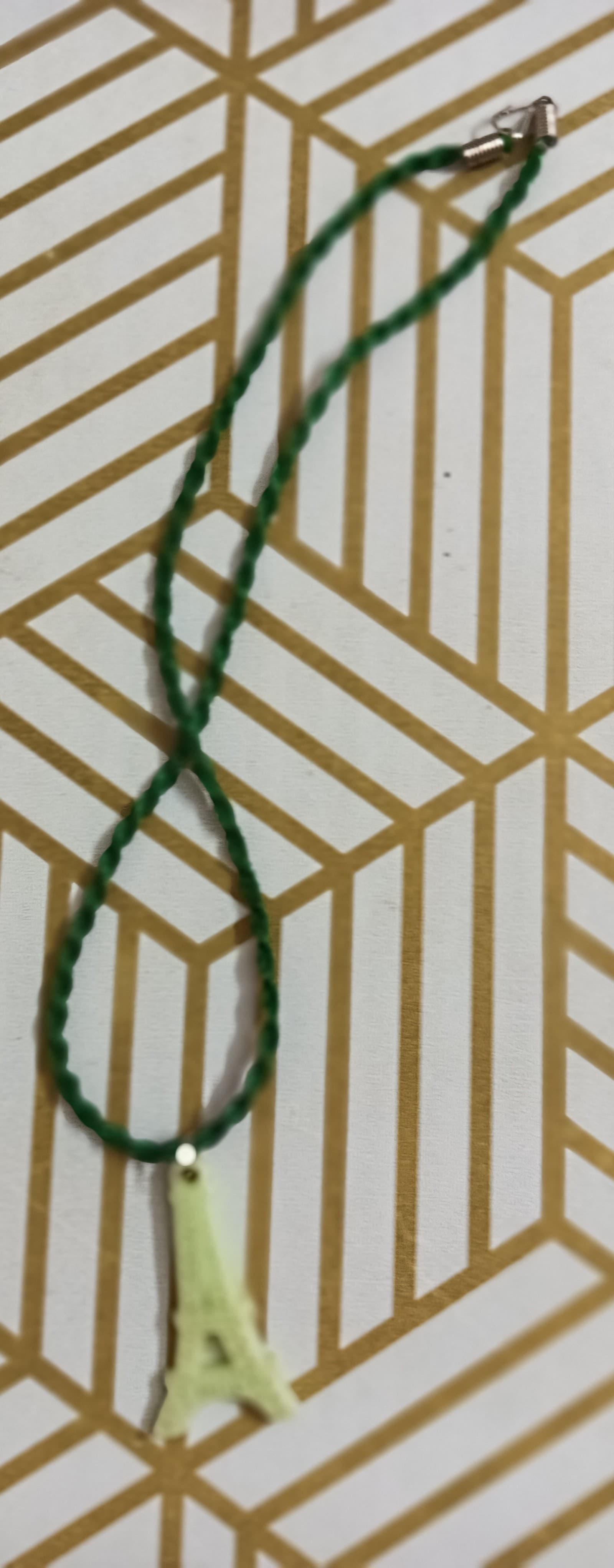 Handmade necklace — dark green with a pale drop