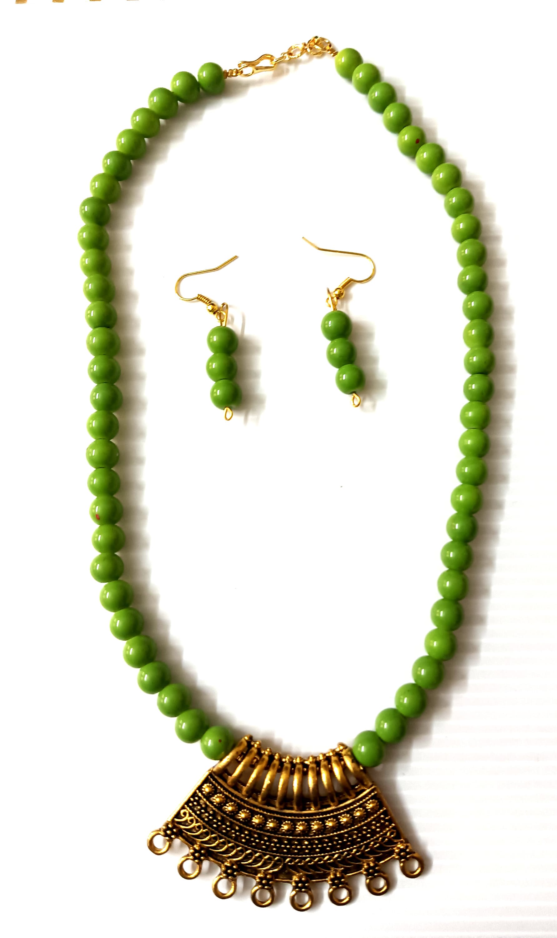 Necklace and earring set — olive green with a brass fringe pendant