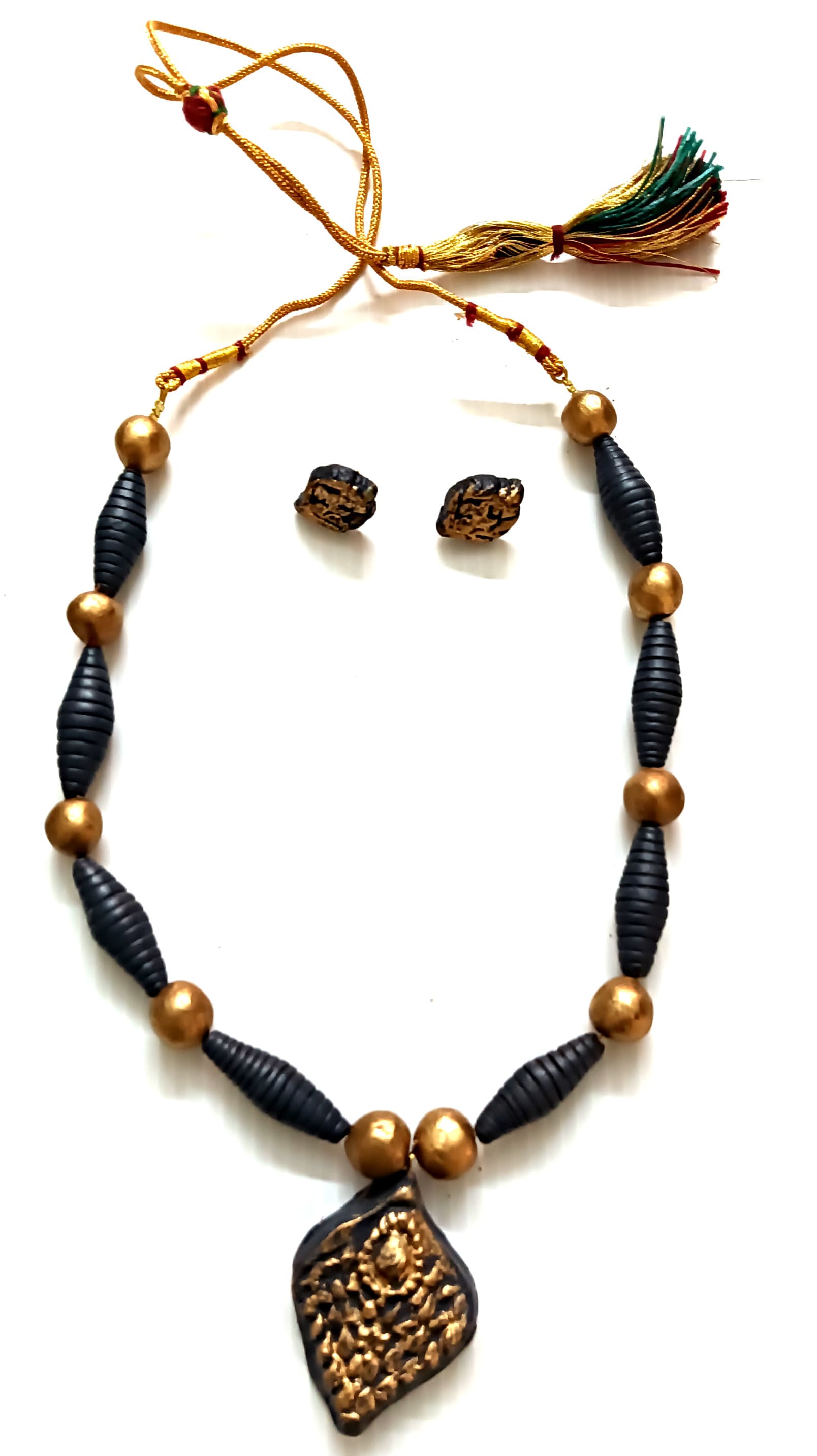 Necklace and earring set — navy and gold with a brass plaque pendant