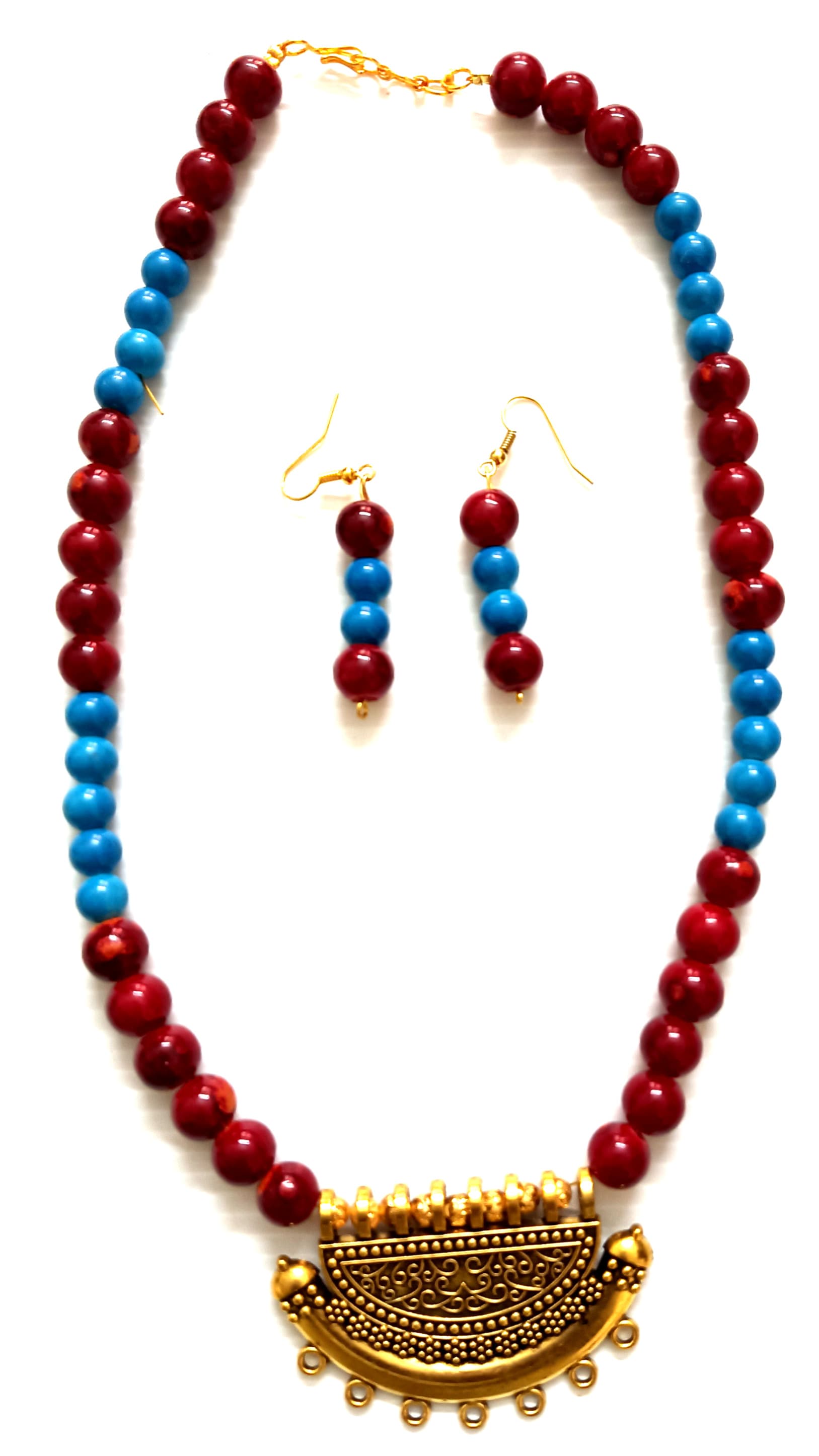 Necklace and earring set — red and blue with a brass pendant