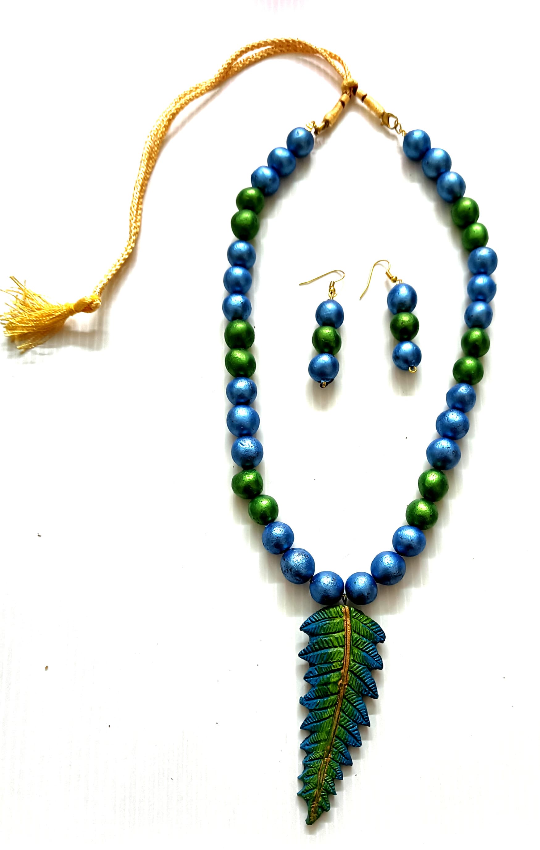 Necklace and earring set — blue and green with a green leaf pendant
