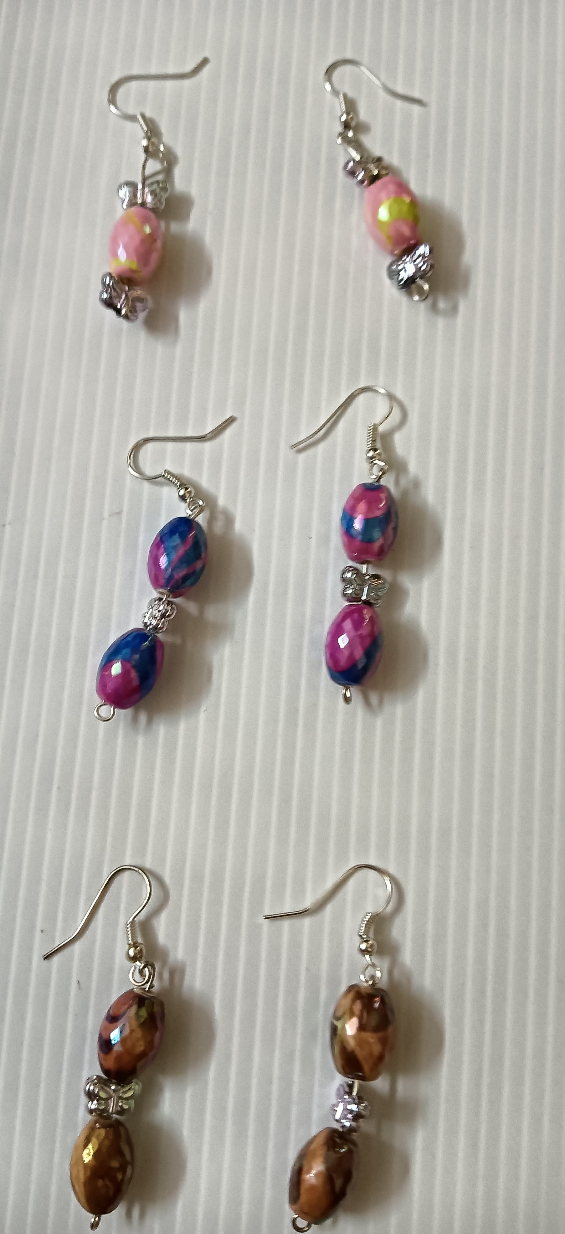 Handmade earrings — pink, violet and brown beaded drops