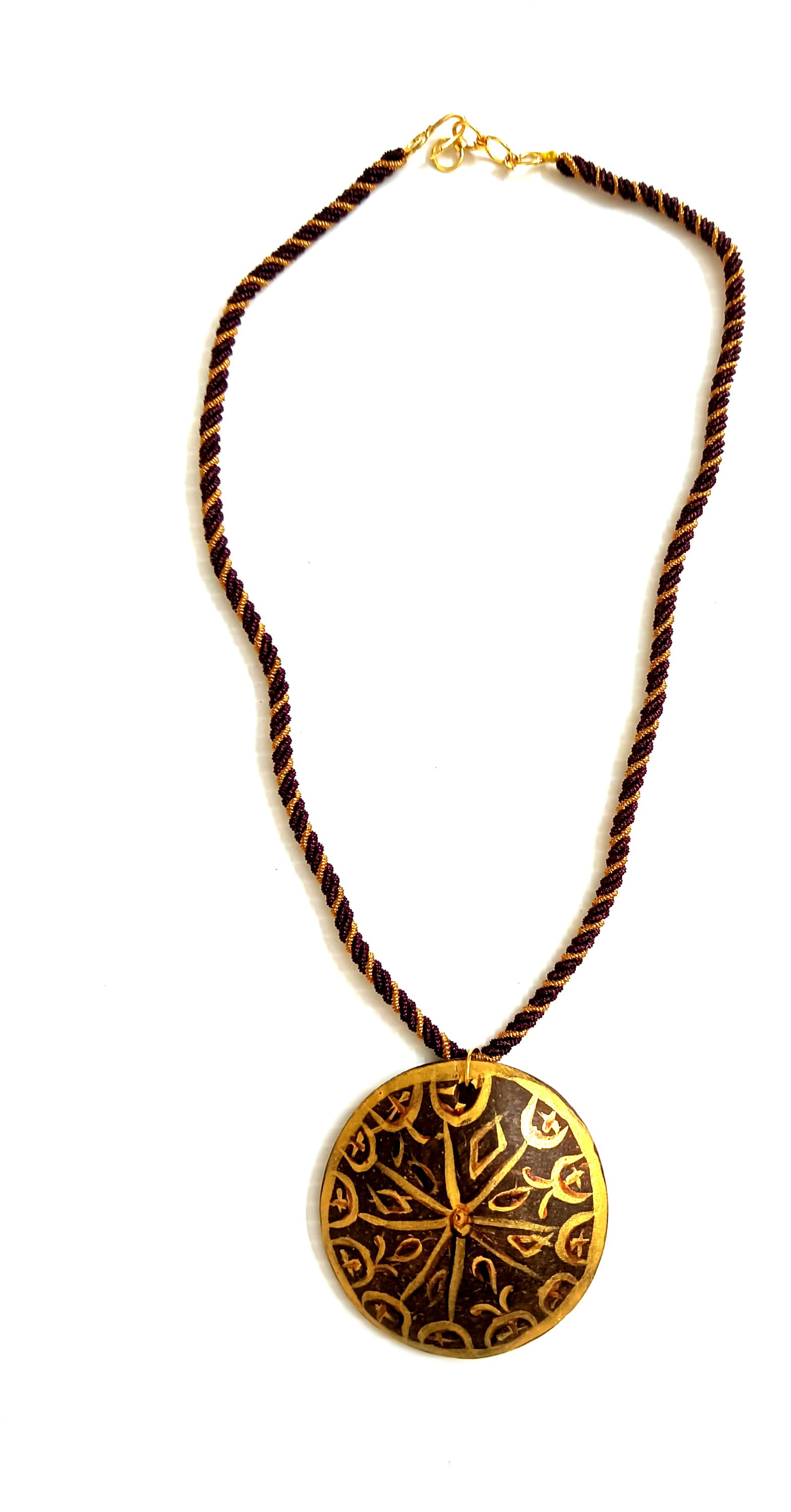 Handmade necklace — brown cord with a brass medallion