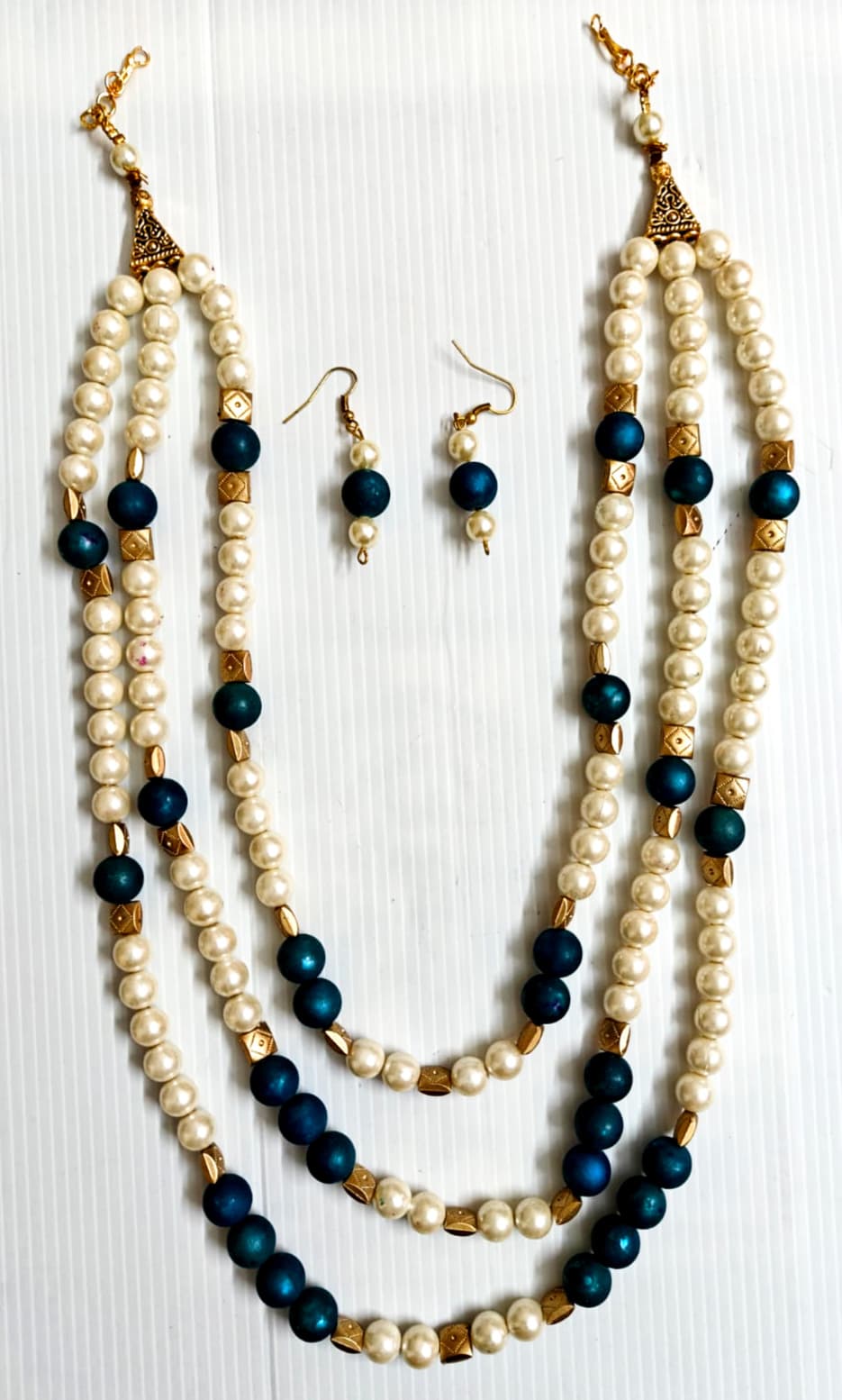 Necklace and earring set — pearl and black three-strand